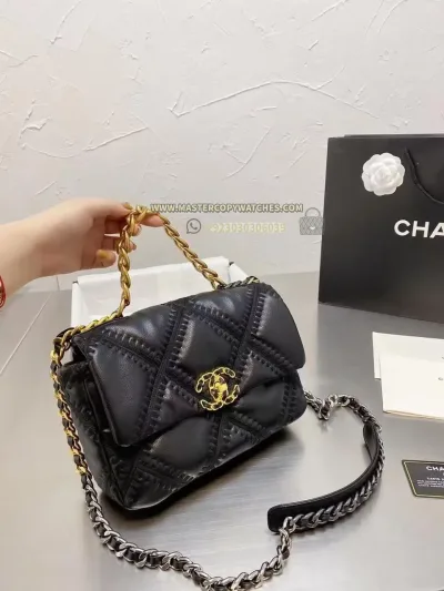 Chanel Black with Gold touch Mini flap Bag